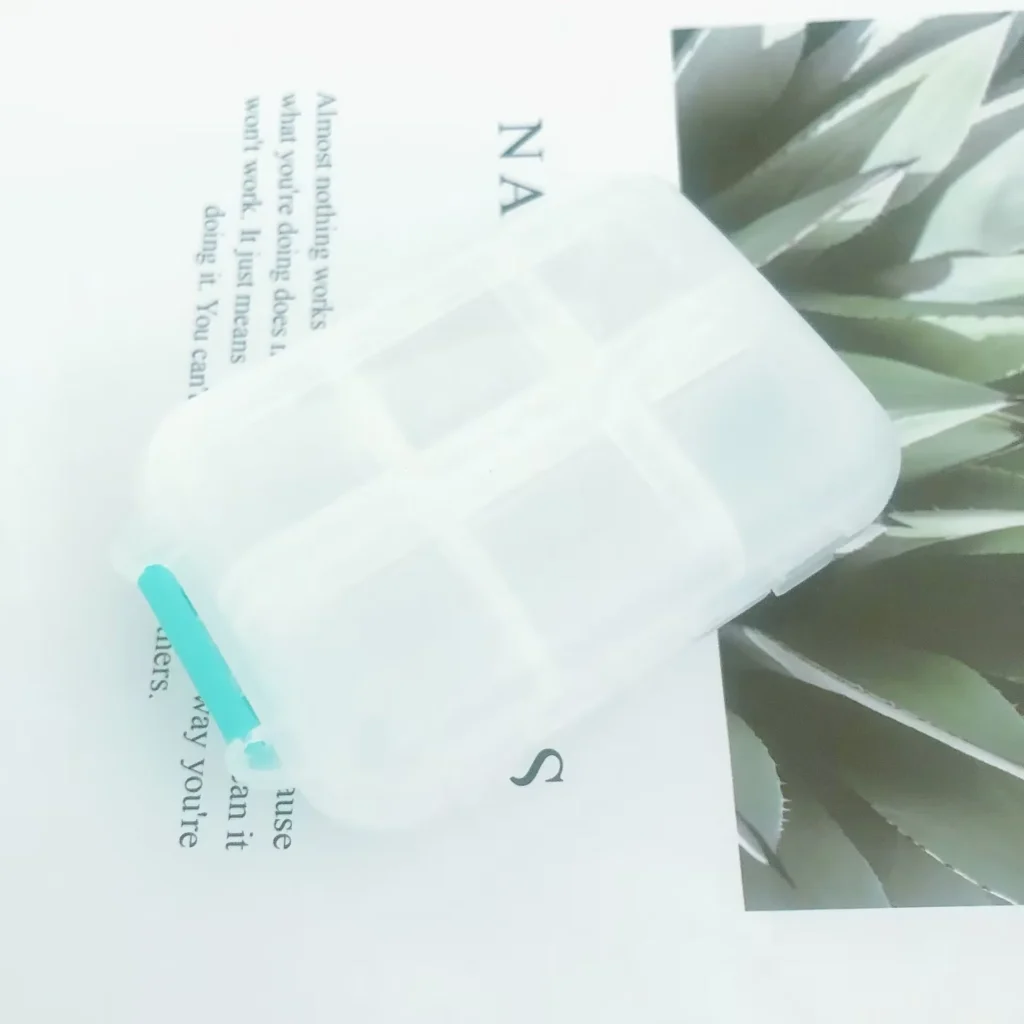 MedicareCoverages™ 12-Grid Travel Pill Organizer – Compact Square Daily Vitamin & Medication Container (White)